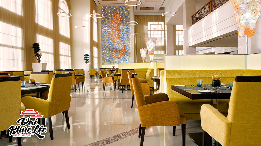 thiết kế nội thất nhà hàng với gam màu vàng